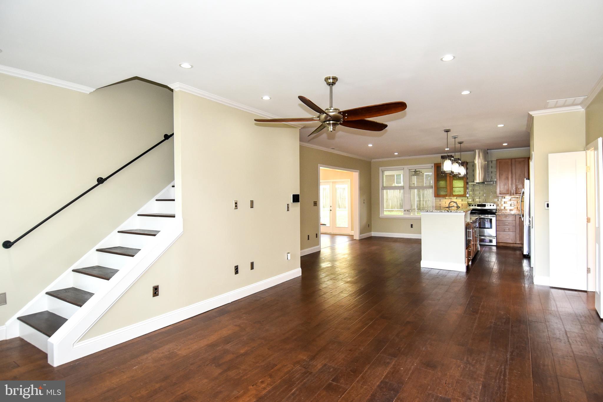 1805 Glenarm Road Edgewater, MD 21037 - Photo 5 of 59 LIVING ROOM AND STAIRS TO UPPER LEVEL 4TH BEDROOM