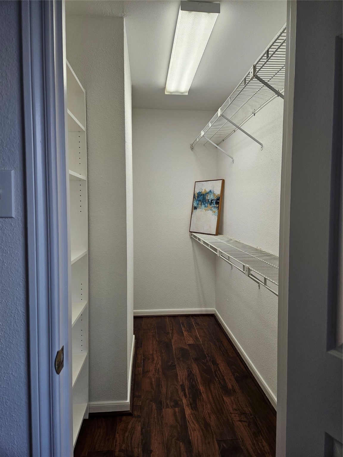 1311 Antoine Drive, Unit 252 Houston, TX 77055 - Photo 15 of 22 a view of hallway with wooden floor