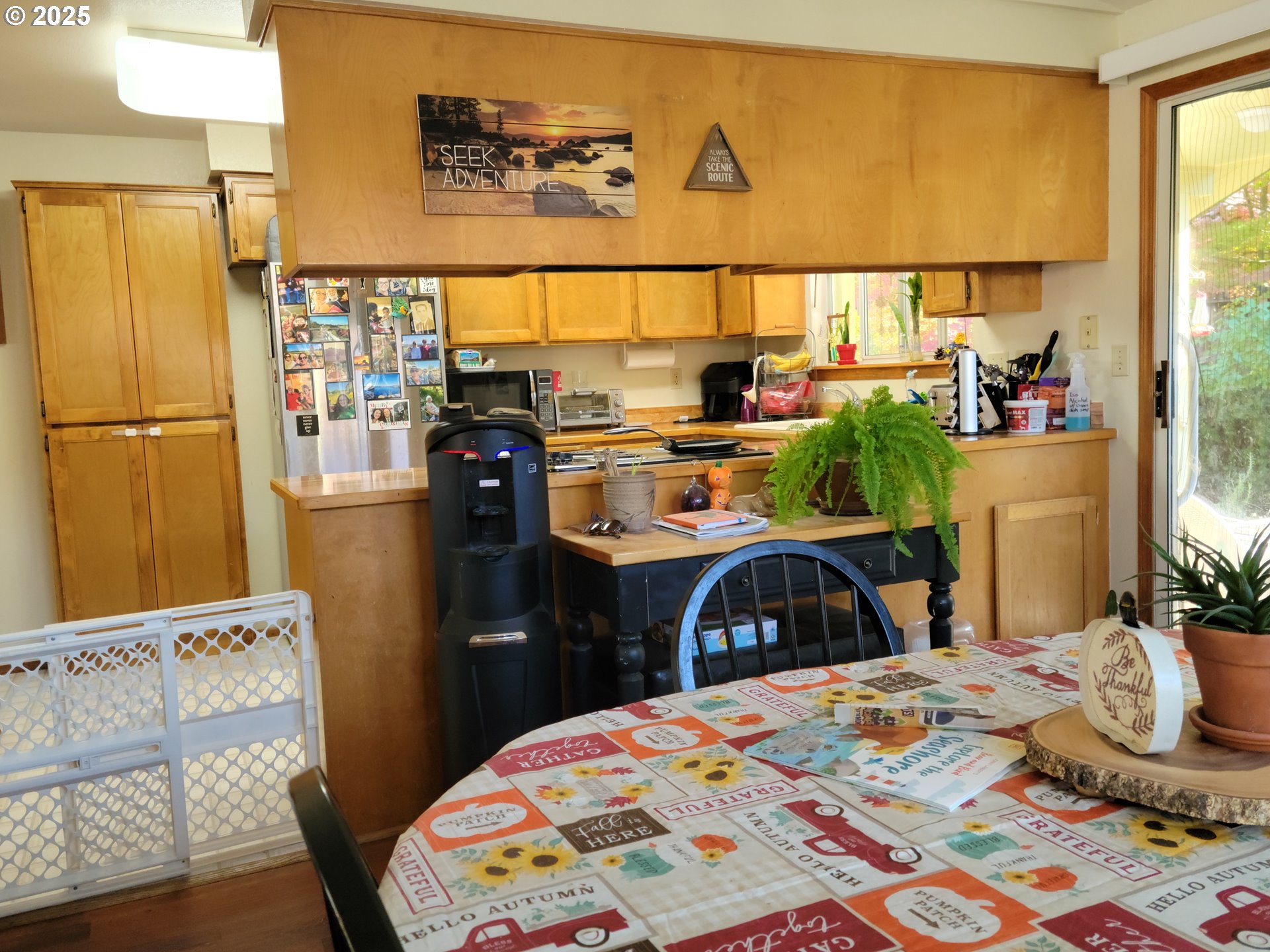 1523 Northwest Thompson Way Grants Pass, OR 97526 - Photo 11 of 39 a bedroom with a bed and wooden floor