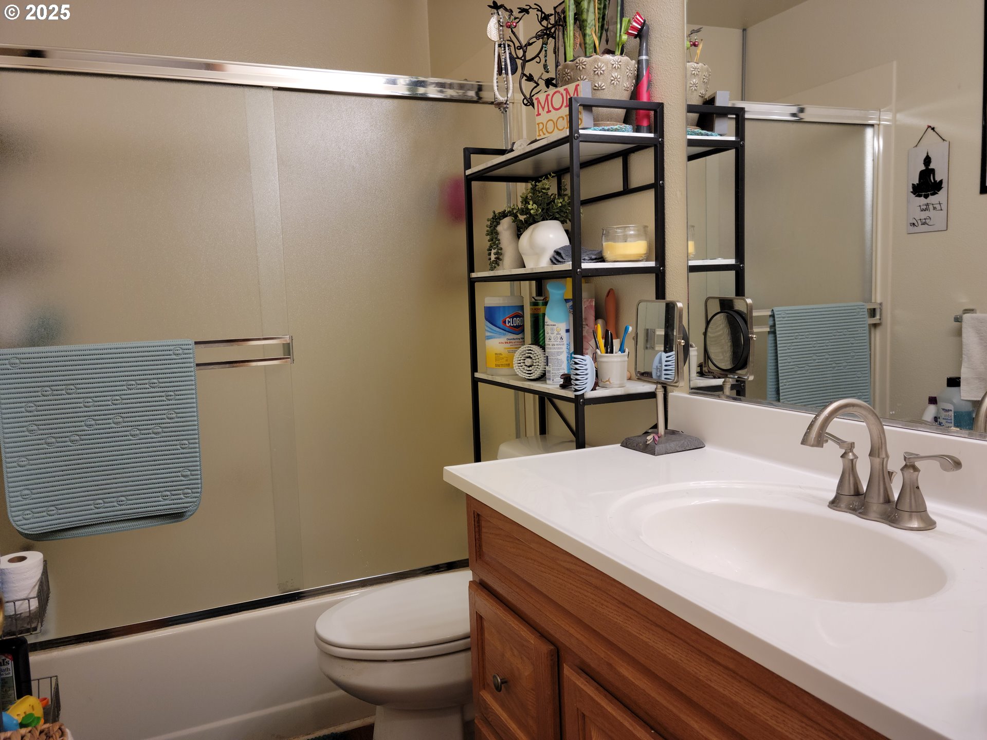 1523 Northwest Thompson Way Grants Pass, OR 97526 - Photo 20 of 39 a bathroom with a sink a toilet and shower