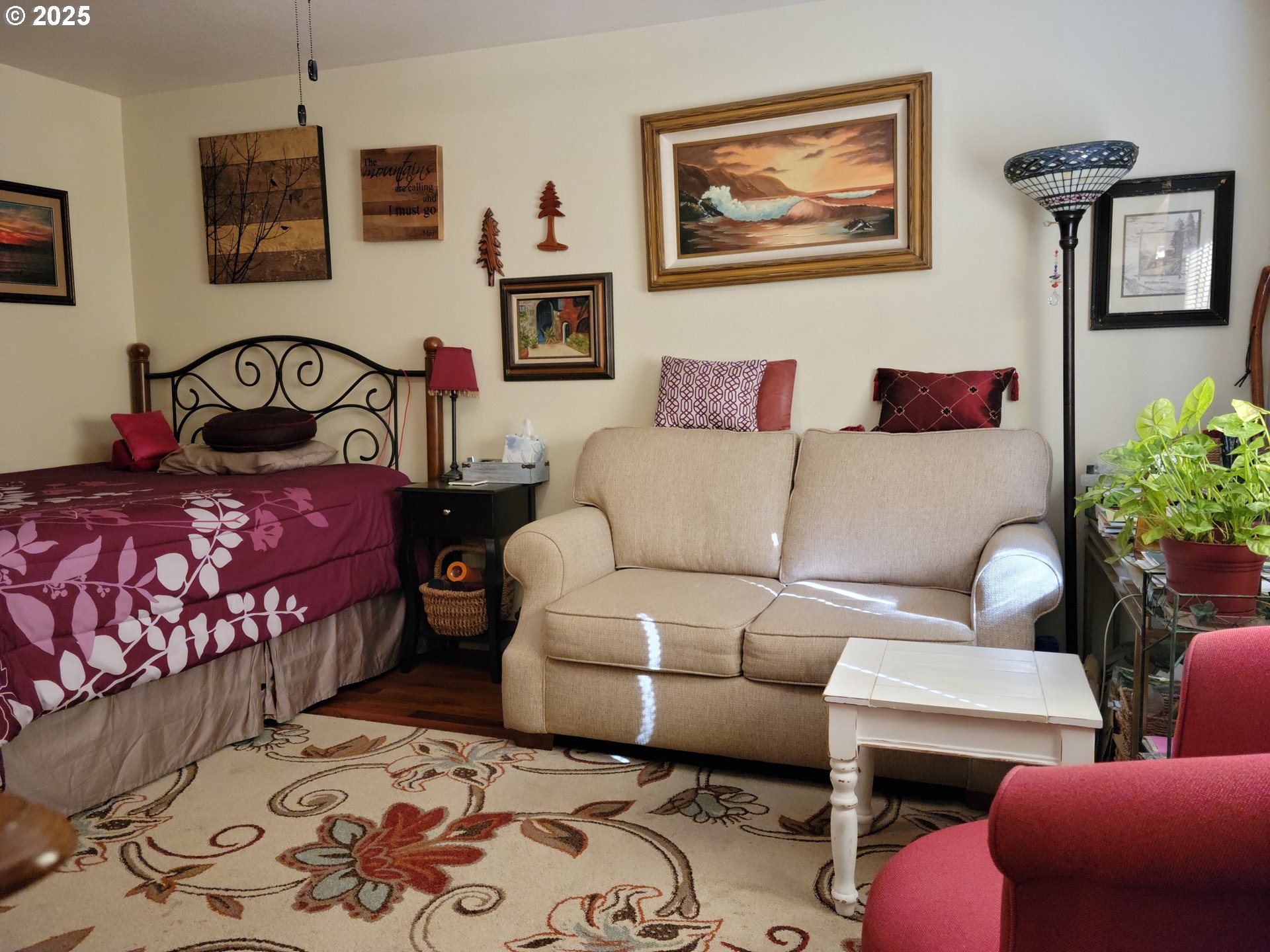 1523 Northwest Thompson Way Grants Pass, OR 97526 - Photo 26 of 39 a living room with furniture and a painting