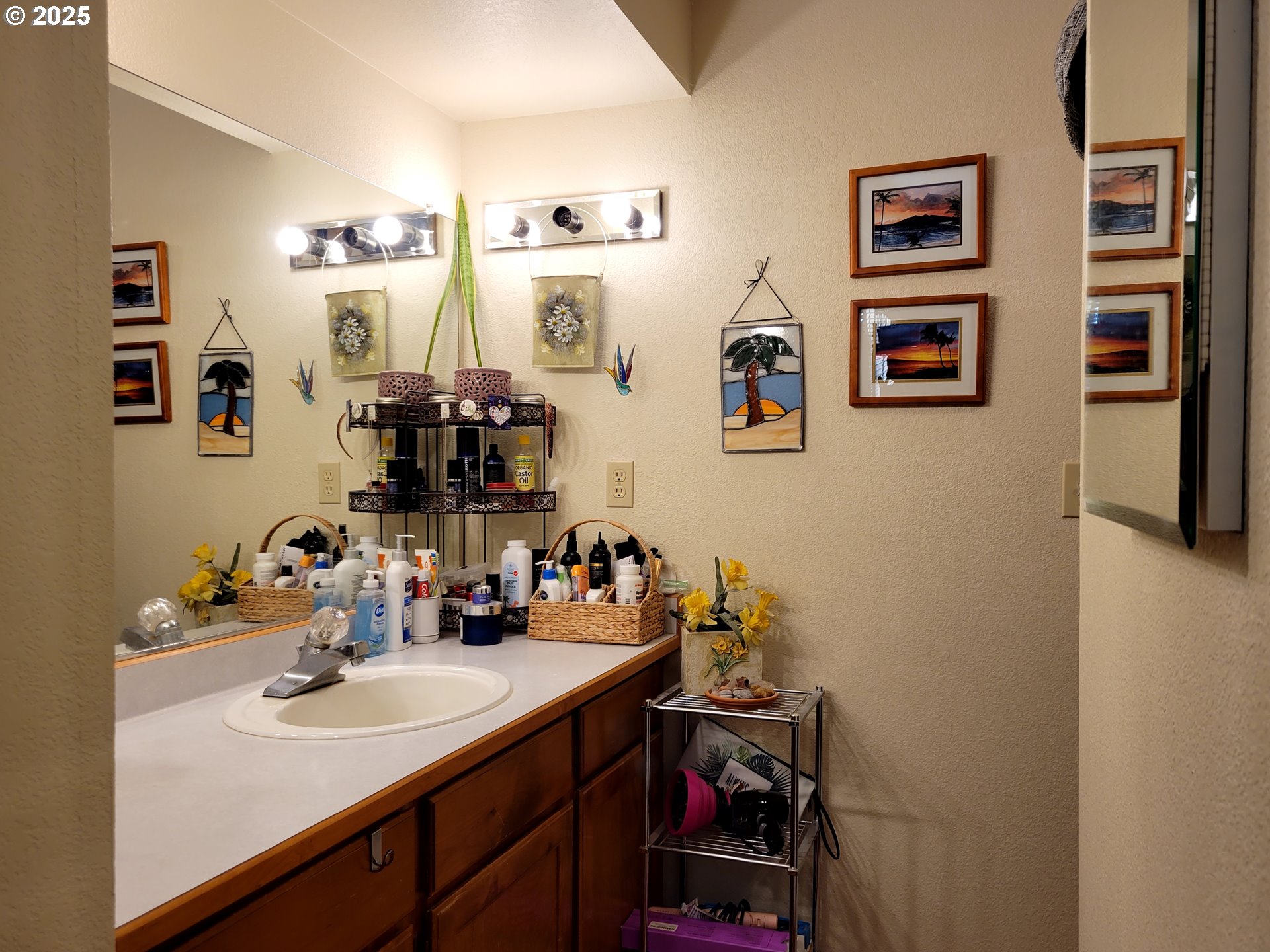 1523 Northwest Thompson Way Grants Pass, OR 97526 - Photo 28 of 39 a bathroom with a sink and a mirror