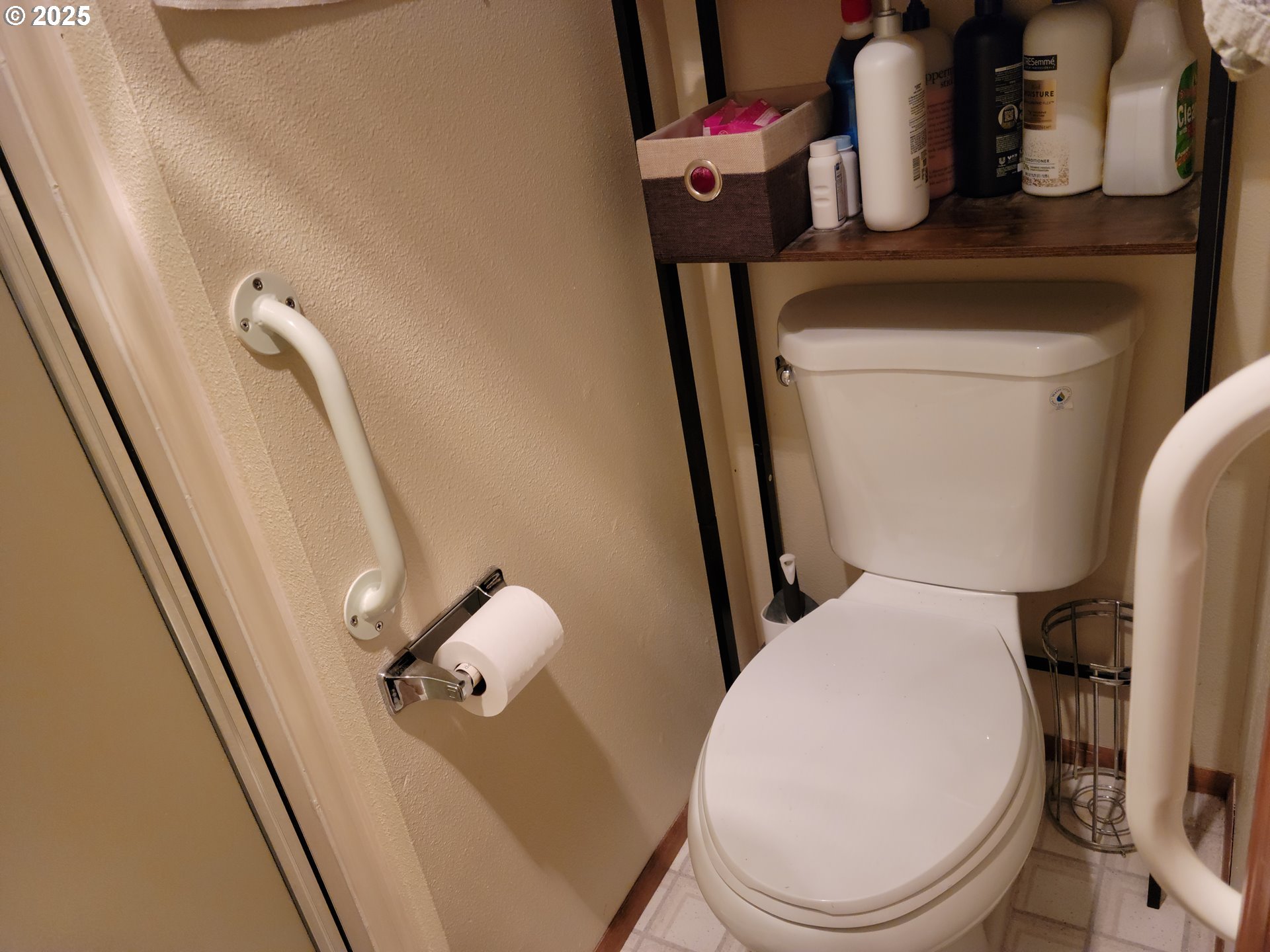 1523 Northwest Thompson Way Grants Pass, OR 97526 - Photo 30 of 39 a white toilet sitting next to a small bathroom
