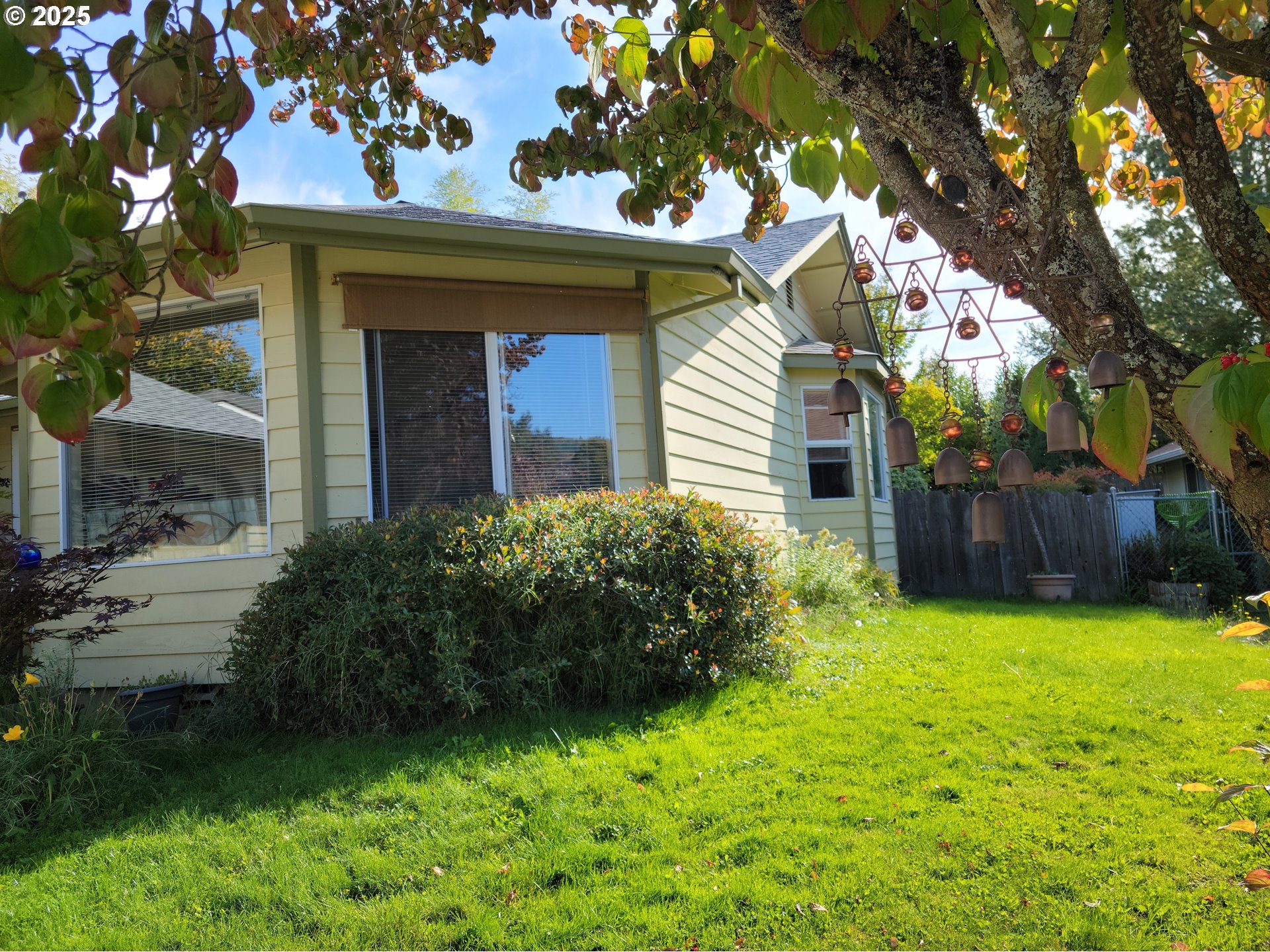 1523 Northwest Thompson Way Grants Pass, OR 97526 - Photo 3 of 39 a view of a house with a garden