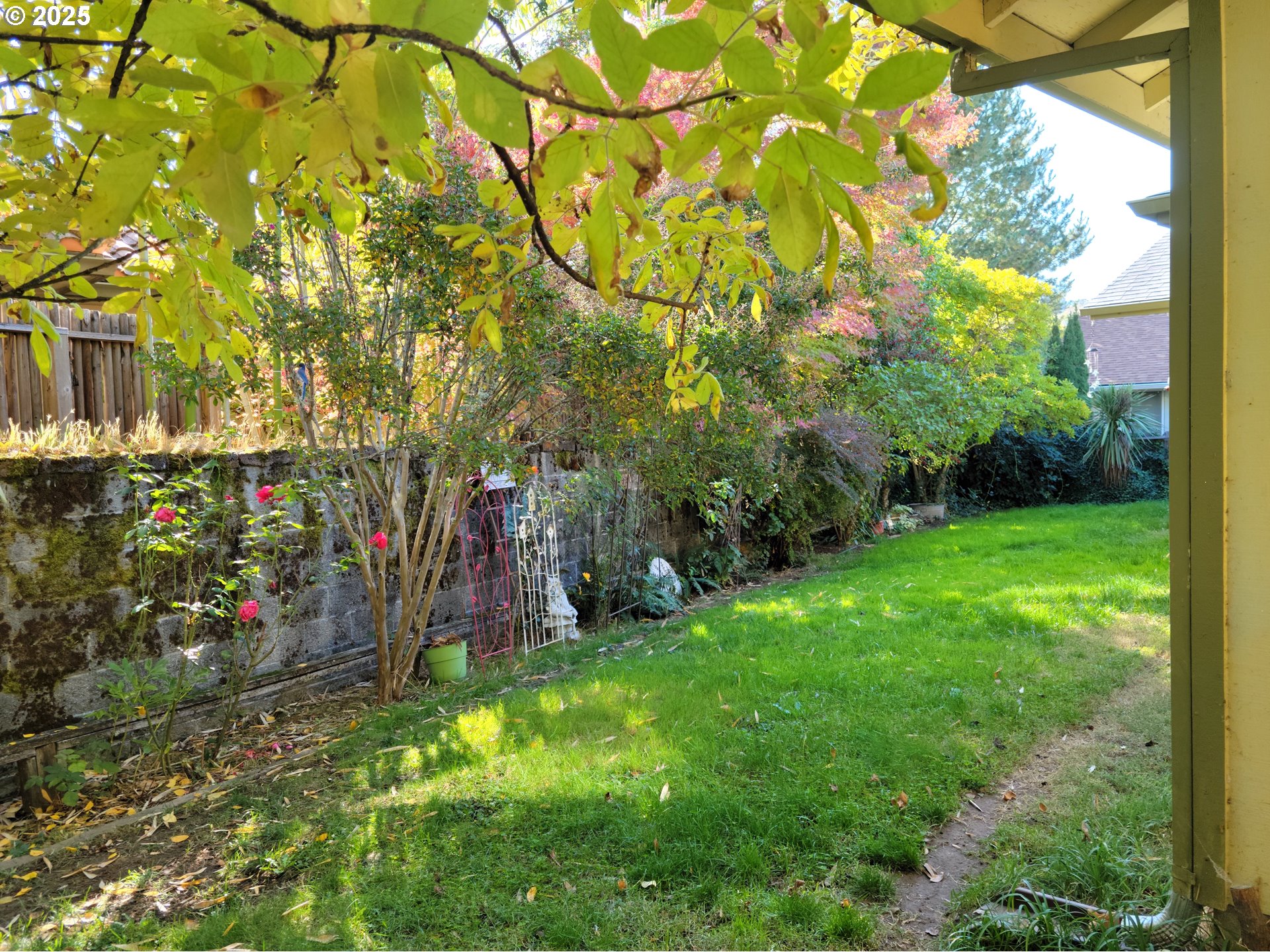 1523 Northwest Thompson Way Grants Pass, OR 97526 - Photo 38 of 39 a view of a garage with a tree