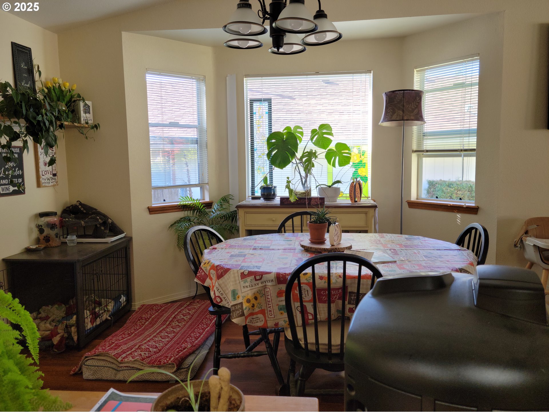 1523 Northwest Thompson Way Grants Pass, OR 97526 - Photo 10 of 39 a view of a dining room with furniture window and outside view