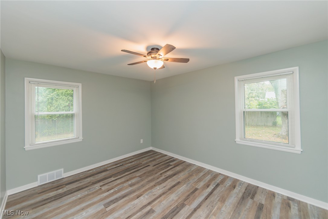 952 Murray Road South Euclid, OH 44121 - Photo 10 of 30 Spare room with light wood-type flooring and ceiling fan