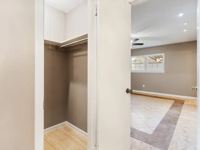 an empty room with windows