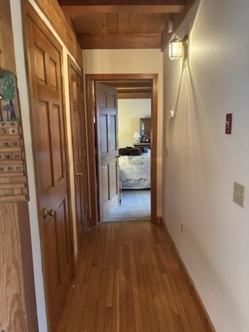 200 Peru Road Windsor, MA 01270 - Photo 25 of 42 a view of a hallway view with wooden floor and staircase
