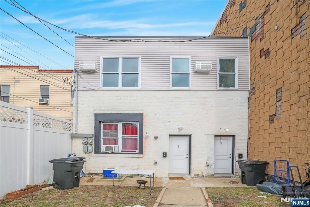 512 Monastery Place, Unit 3 Union City, NJ 07087 - Photo 11 of 11 a view of a brick building with many windows