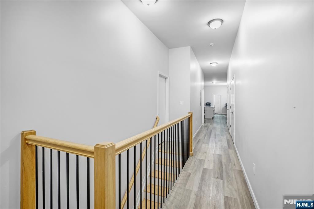 512 Monastery Place, Unit 3 Union City, NJ 07087 - Photo 7 of 11 a view of hallway with stairs
