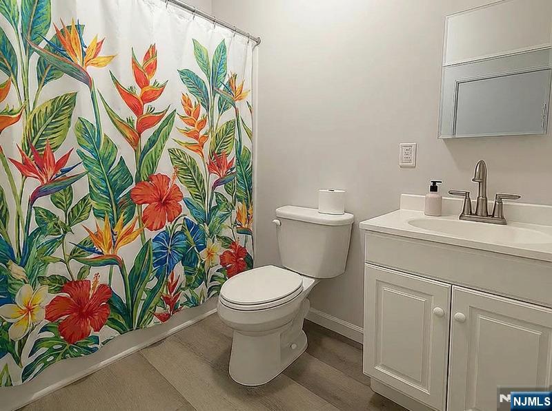 512 Monastery Place, Unit 3 Union City, NJ 07087 - Photo 10 of 11 a bathroom with a toilet and a sink