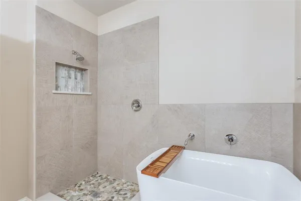 a bathroom with a bathtub
