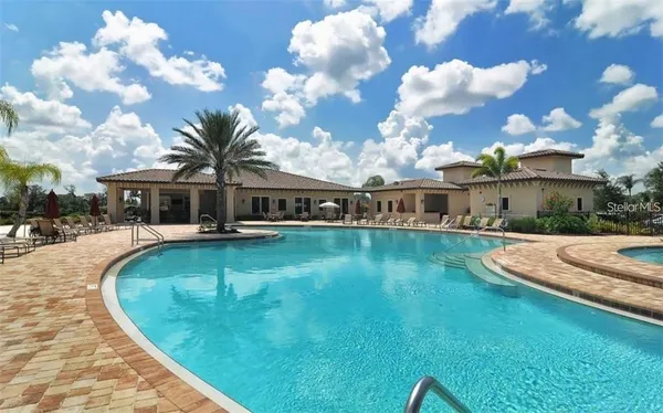 a view of a house with swimming pool