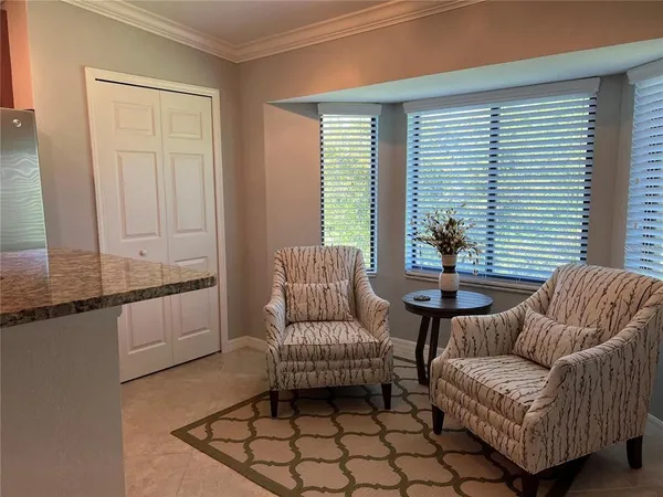 a living room with furniture and window