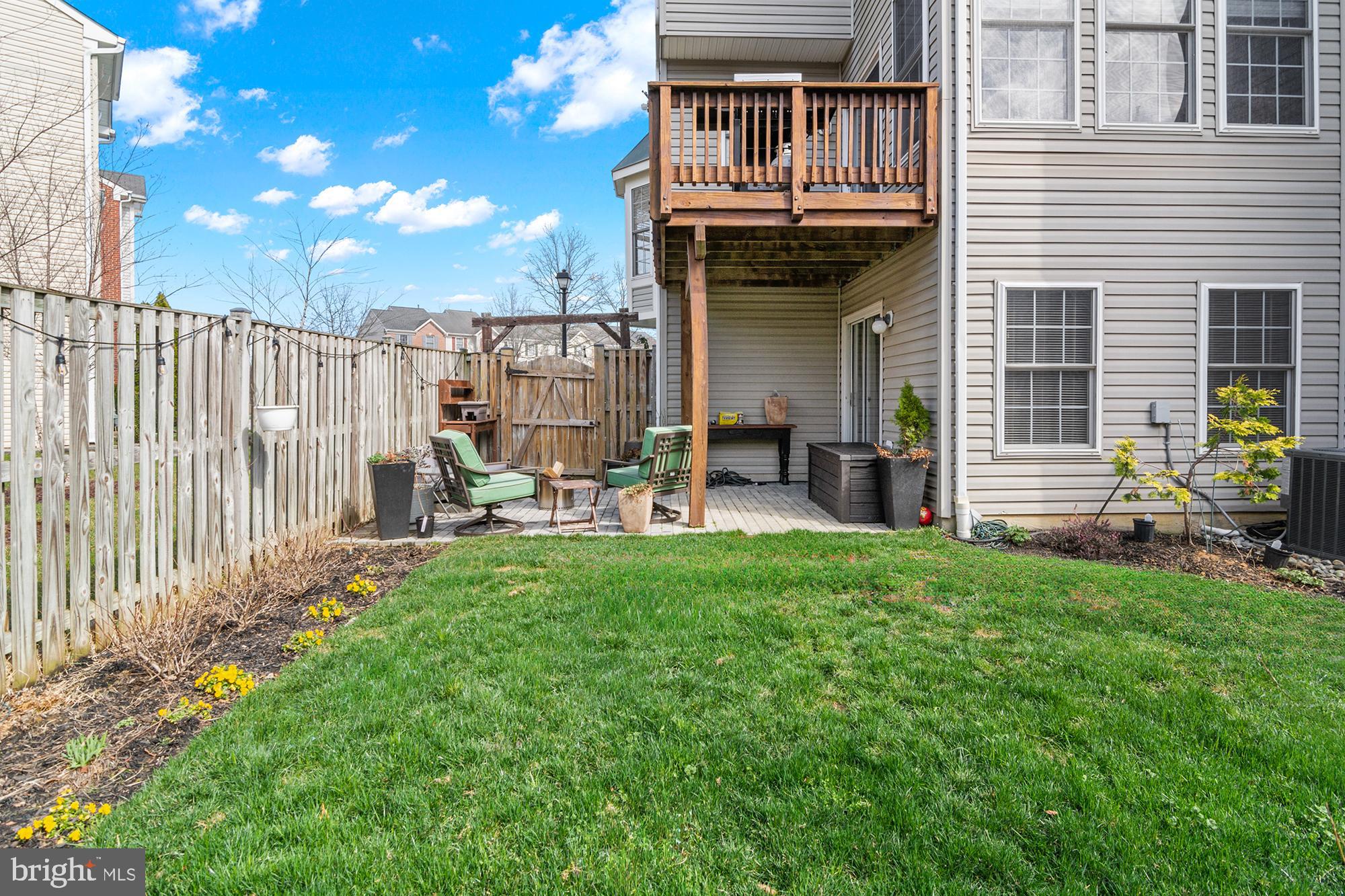 1010 Carbondale Way Crofton, MD 21114 - Photo 59 of 65 a view of a house with backyard and porch