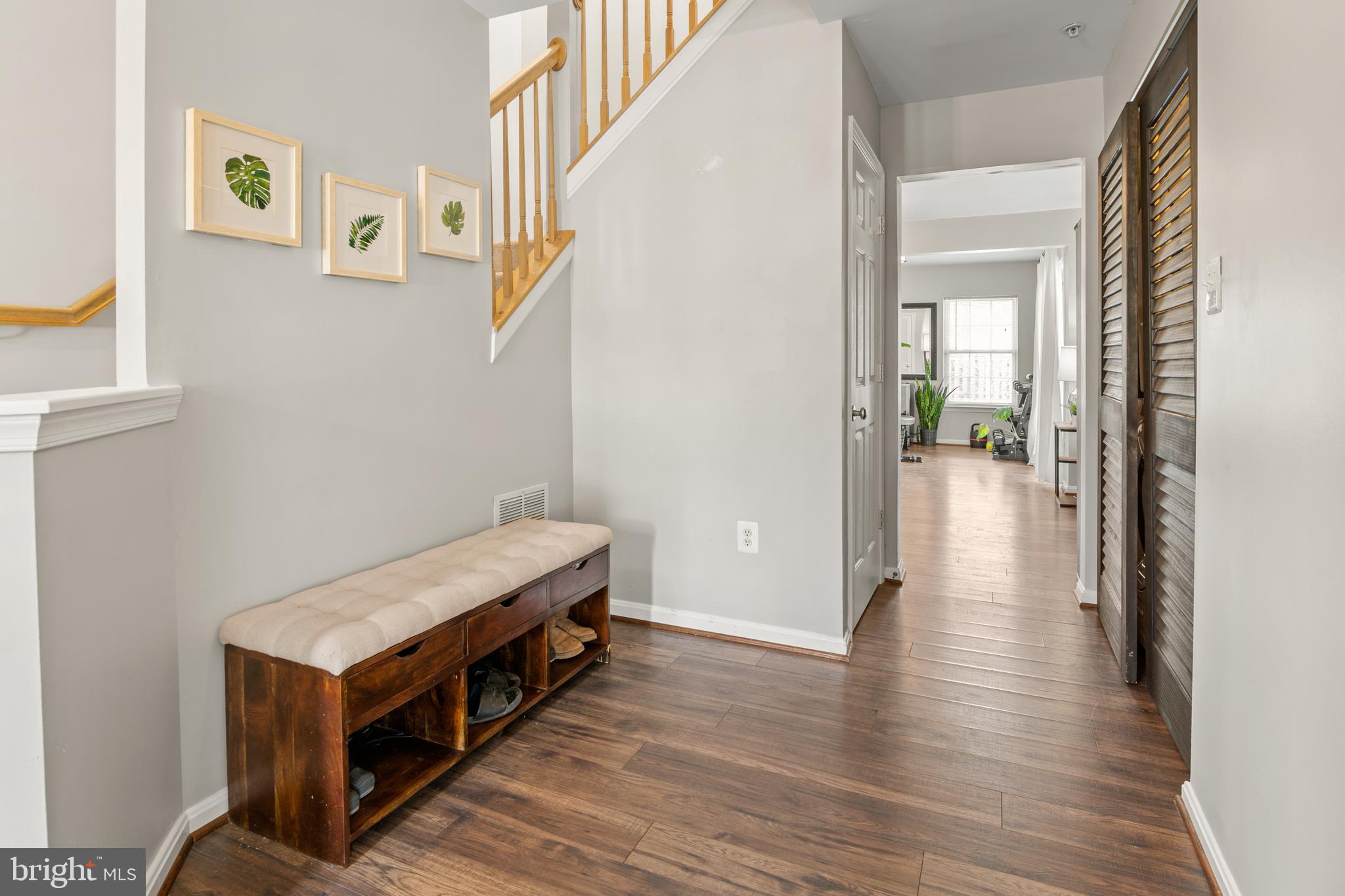 1010 Carbondale Way Crofton, MD 21114 - Photo 9 of 65 a view of a hallway view with wooden floor and staircase