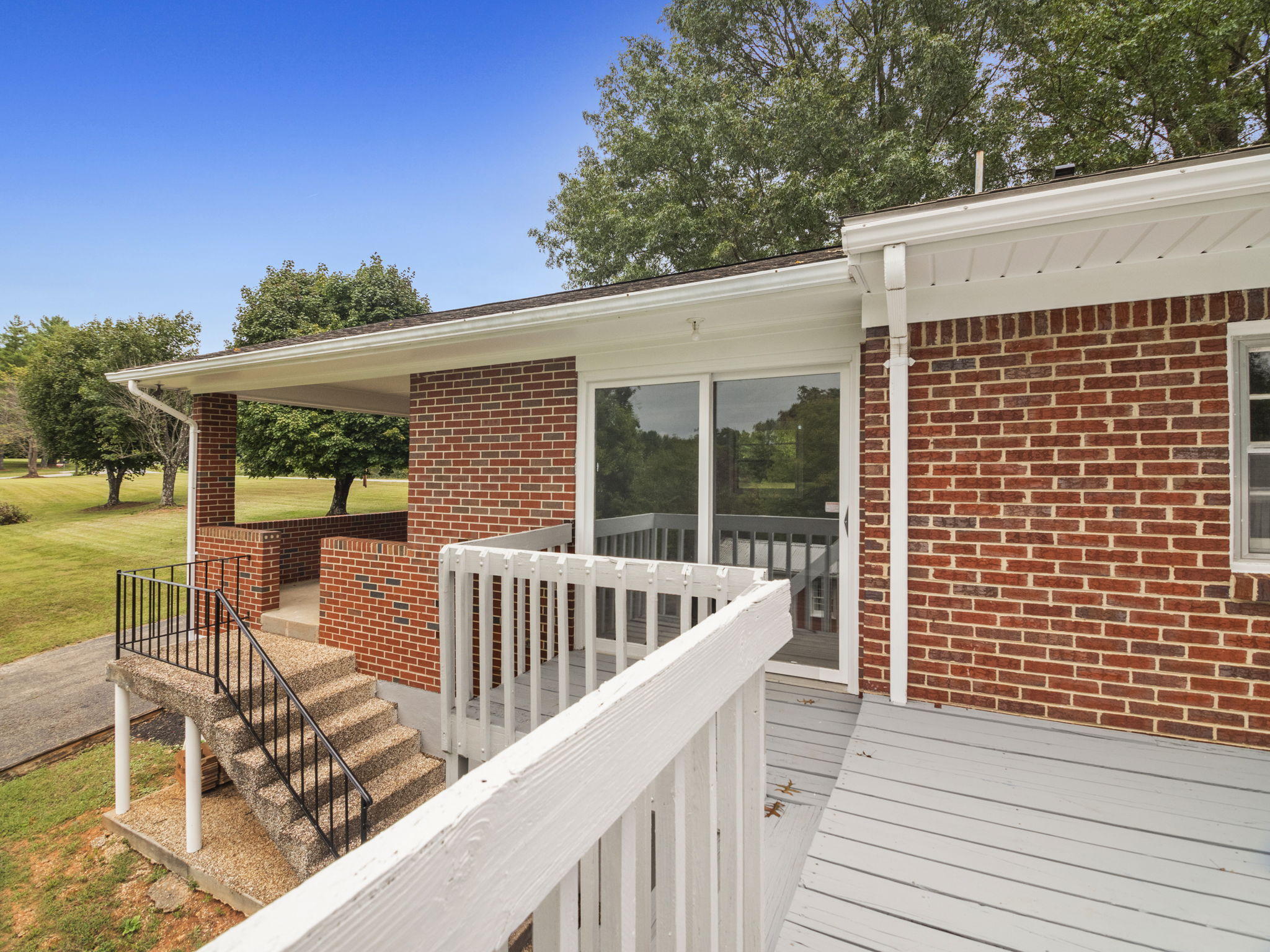 2665 Iron Ridge Road Rocky Mount, VA 24151 - Photo 8 of 26 a view of a chair and tables in the balcony