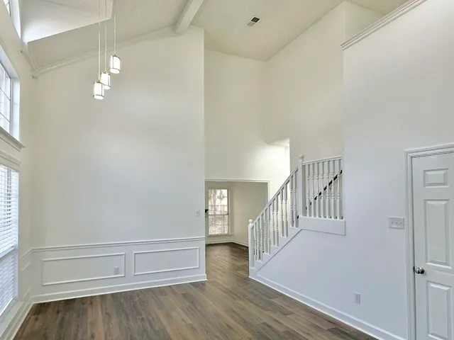 a view of entryway with wooden floor