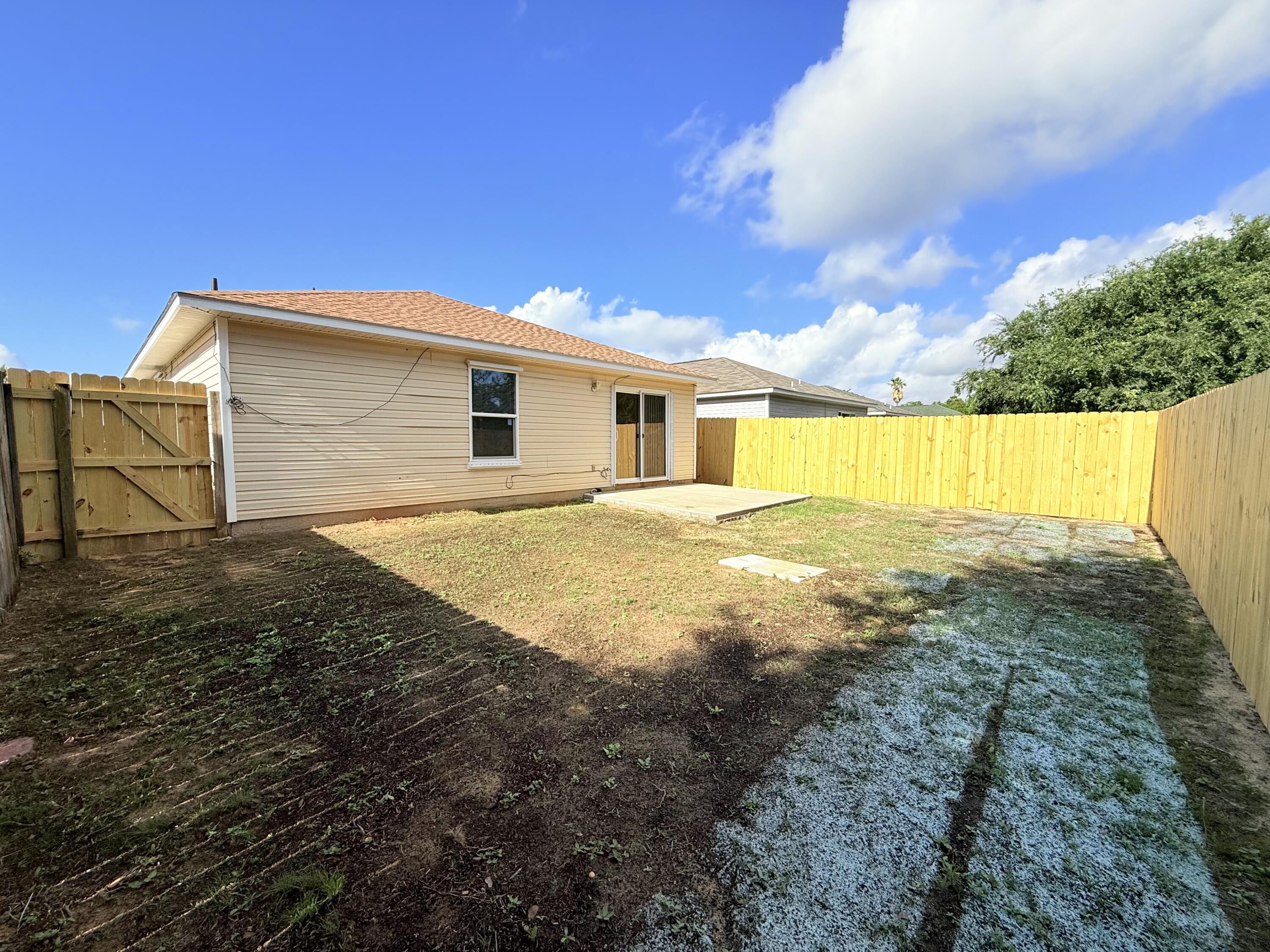 7612 Chablis Circle Navarre, FL 32566 - Photo 14 of 16 a view of backyard of house