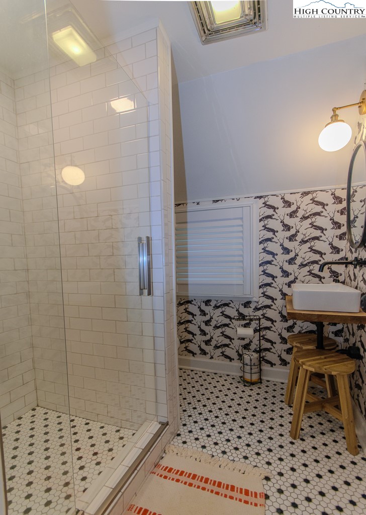 205 Spring Branch Road Beech Mountain, NC 28604 - Photo 28 of 46 a bathroom with a shower