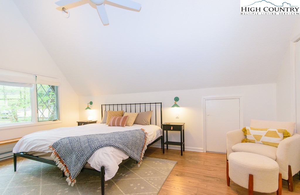 205 Spring Branch Road Beech Mountain, NC 28604 - Photo 31 of 46 a bedroom with a bed and window