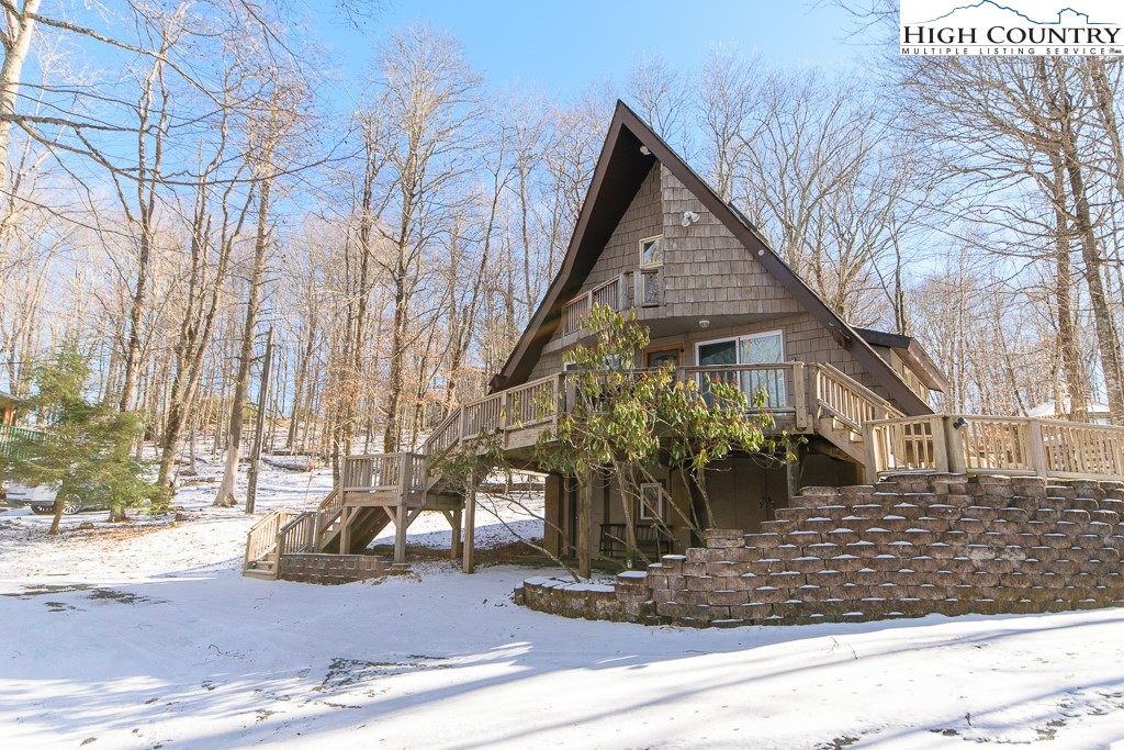 205 Spring Branch Road Beech Mountain, NC 28604 - Photo 45 of 46 a front view of a house
