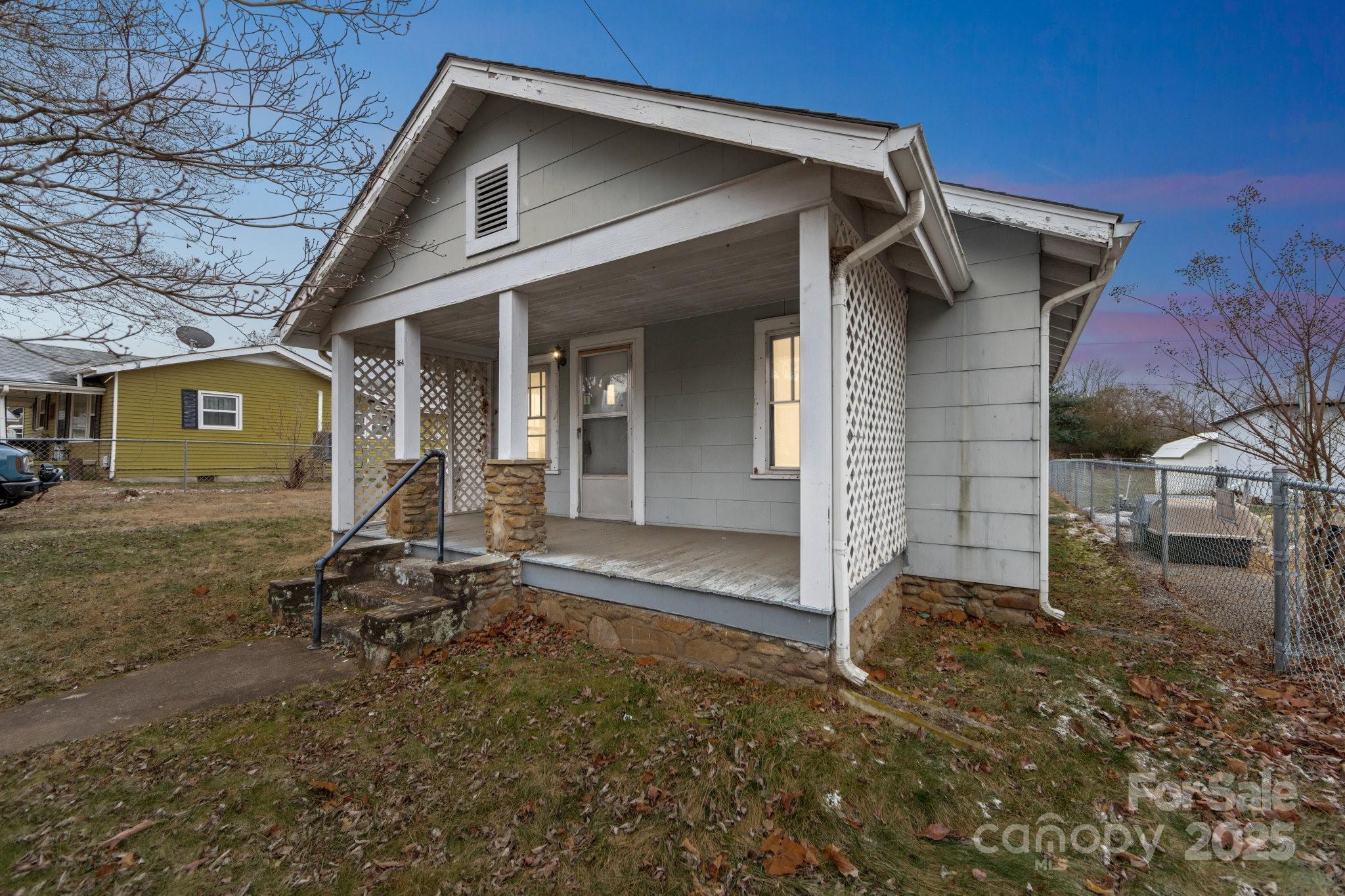 364 Browning Road Waynesville, NC 28786 - Photo 1 of 29 a view of a house with a yard