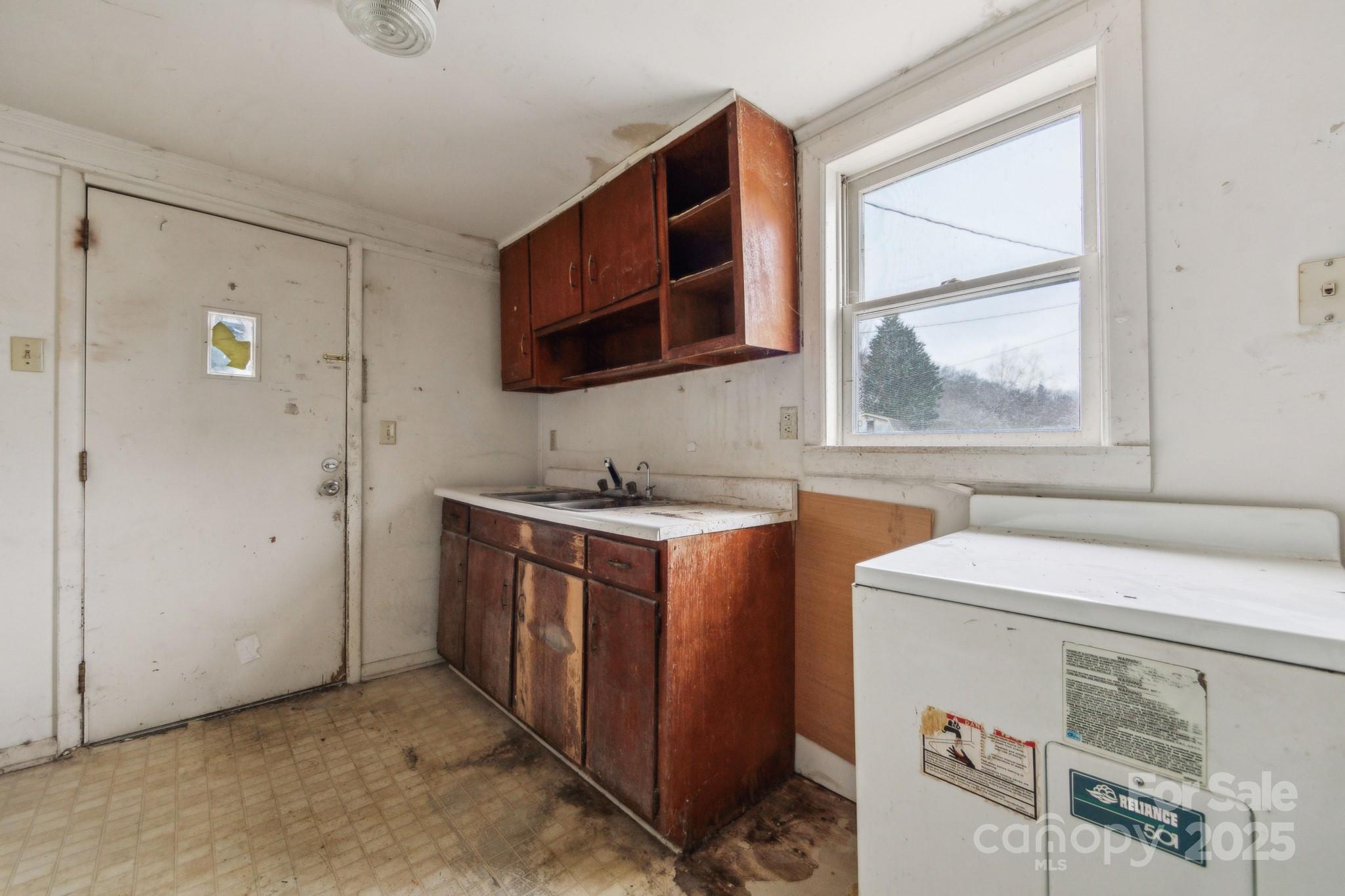 364 Browning Road Waynesville, NC 28786 - Photo 18 of 29 a utility room with a washer and dryer