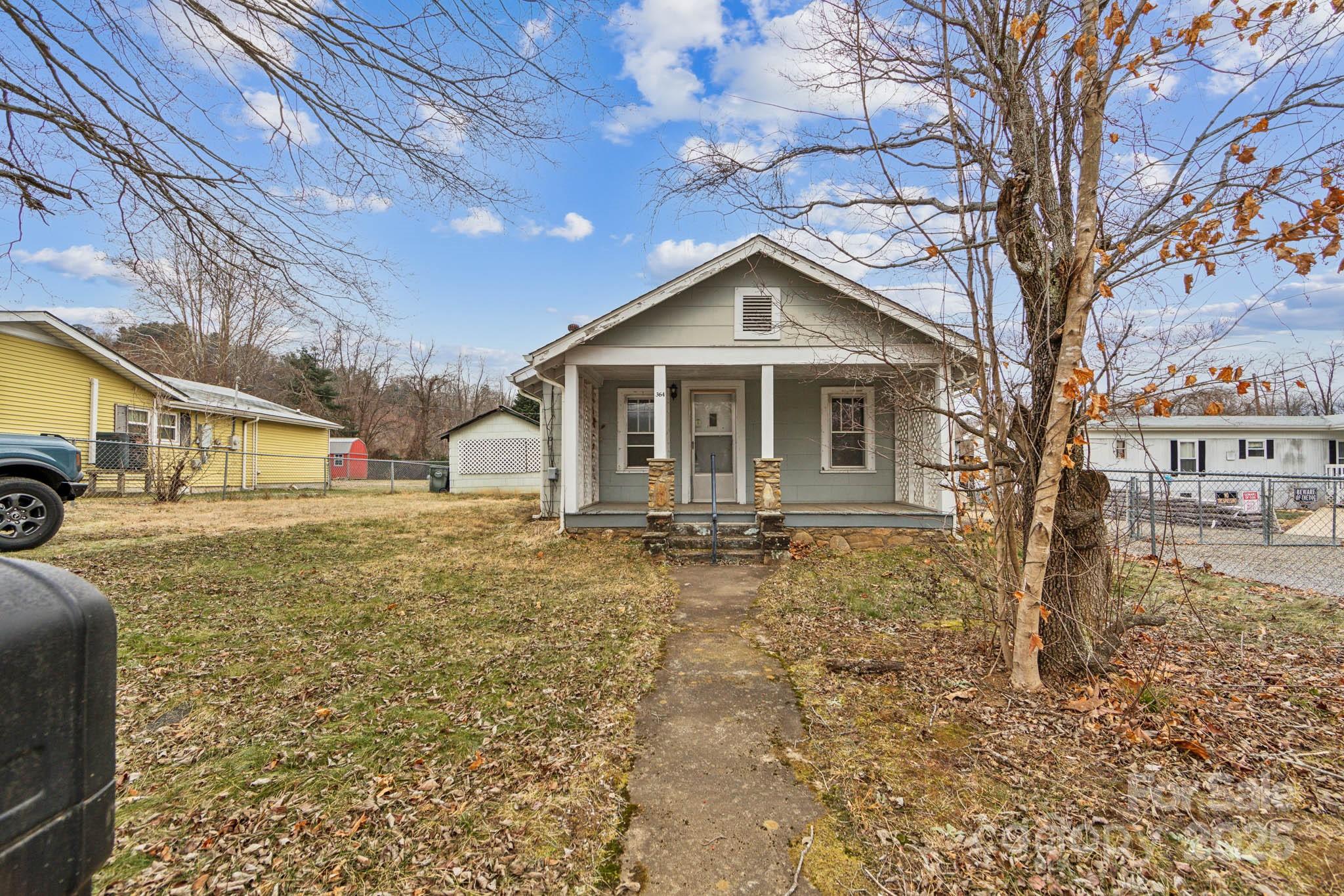 364 Browning Road Waynesville, NC 28786 - Photo 2 of 29 a front view of a house with a yard