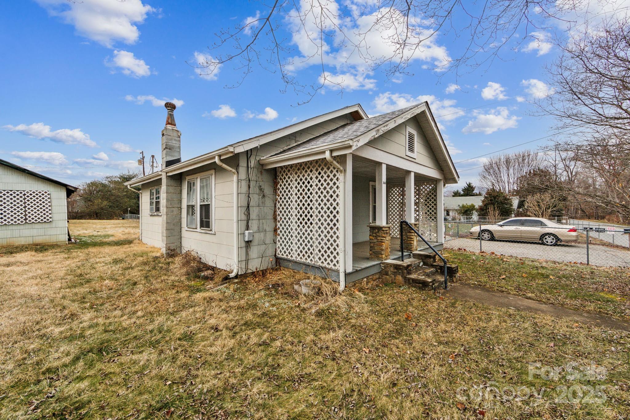 364 Browning Road Waynesville, NC 28786 - Photo 3 of 29 a front view of a house with a yard