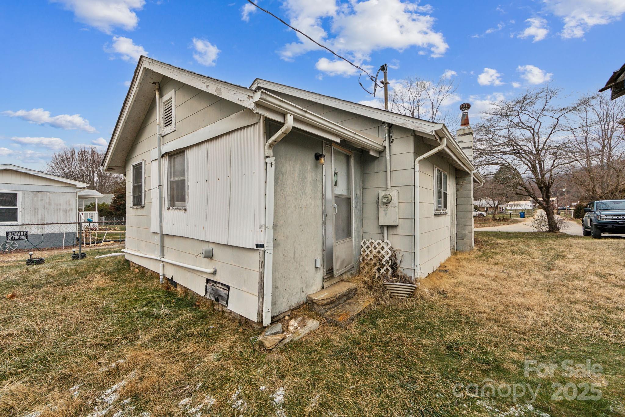 364 Browning Road Waynesville, NC 28786 - Photo 4 of 29 a view of a house with a yard