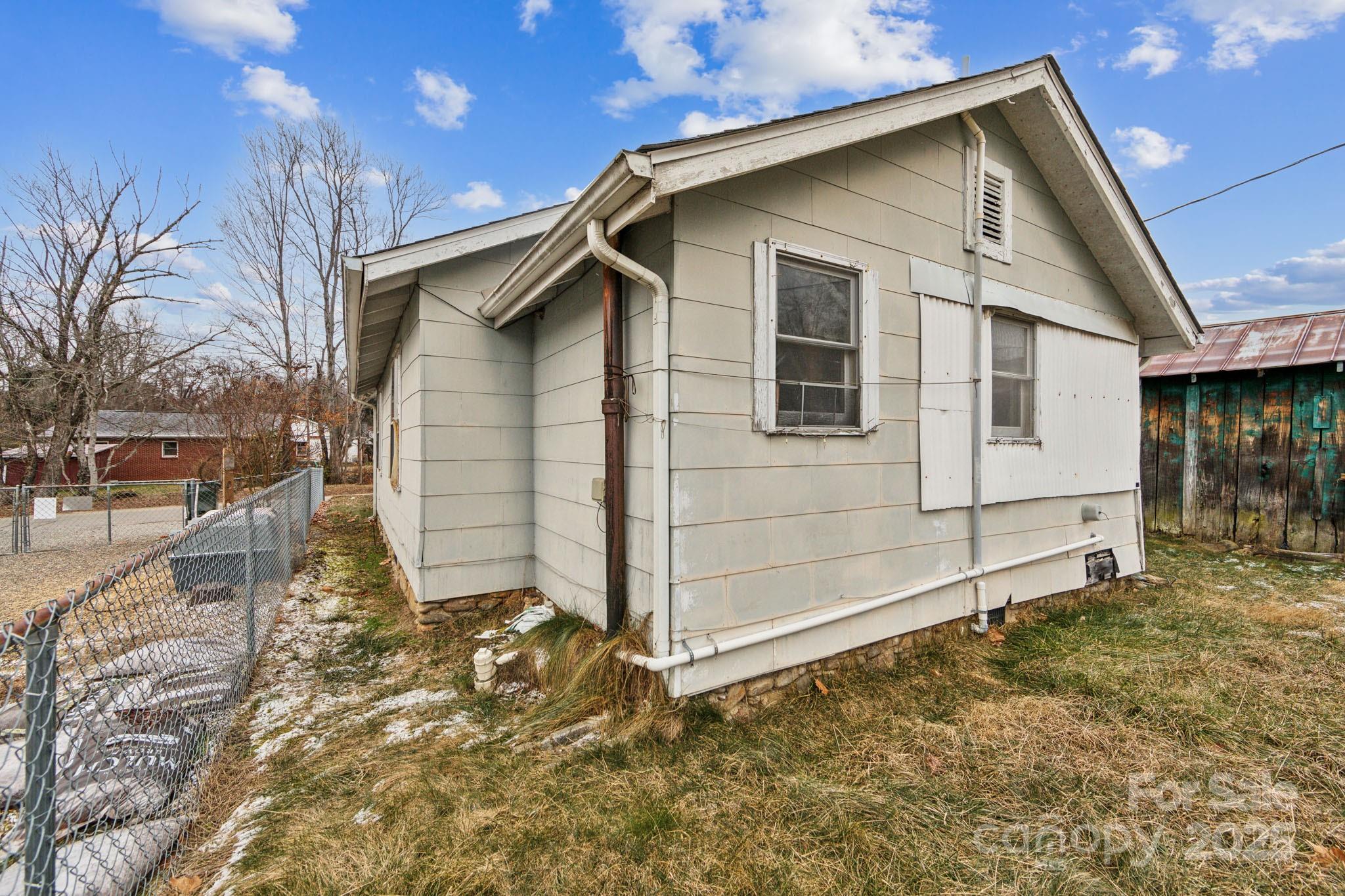 364 Browning Road Waynesville, NC 28786 - Photo 6 of 29 a view of a house with a yard