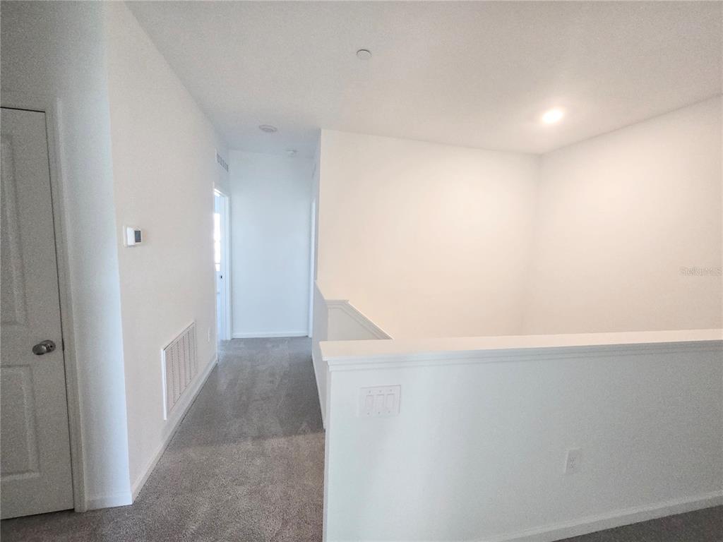 2376 Rider Rain Lane Apopka, FL 32703 - Photo 12 of 27 a view of hallway