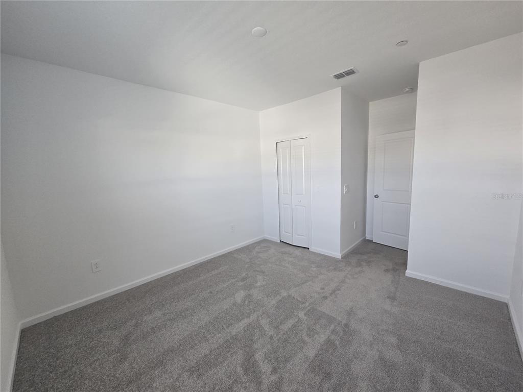 2376 Rider Rain Lane Apopka, FL 32703 - Photo 18 of 27 a view of an empty room