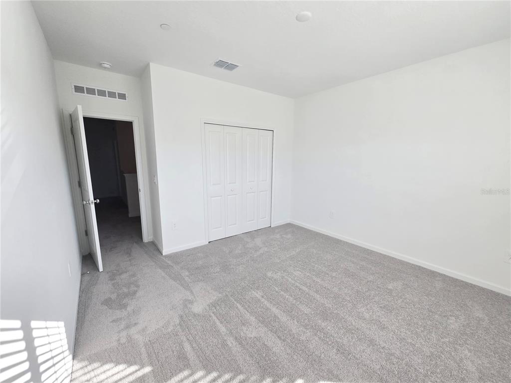 2376 Rider Rain Lane Apopka, FL 32703 - Photo 19 of 27 a view of an empty room