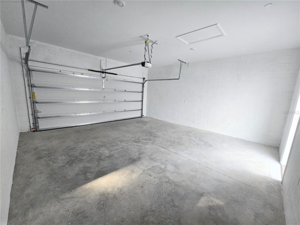 2376 Rider Rain Lane Apopka, FL 32703 - Photo 26 of 27 a view of walk in closet with empty racks