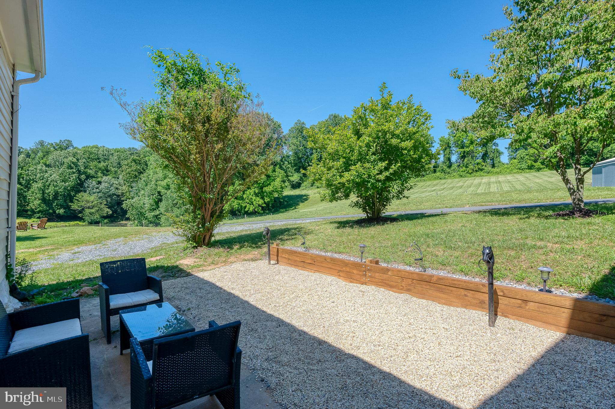 3248 Charles Street Fallston, MD 21047 - Photo 56 of 84 Serene outdoor retreat with lush greenery.