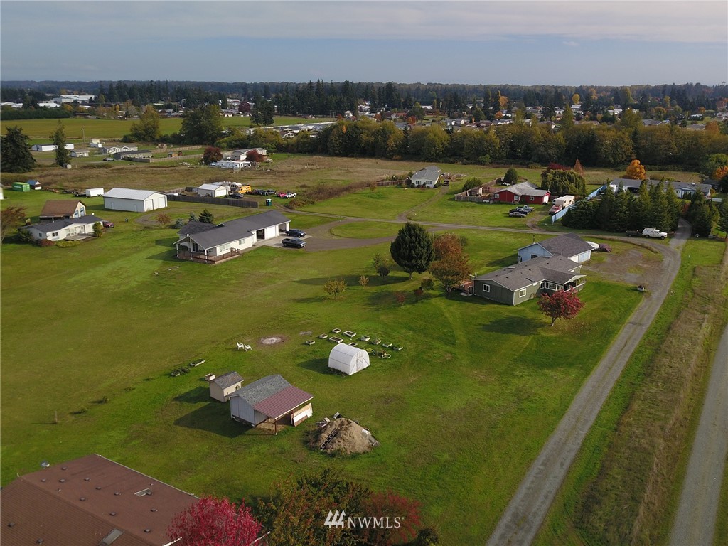 411 Spencer Road Sequim, WA 98382 - Photo 5 of 40 a view of a lake with houses