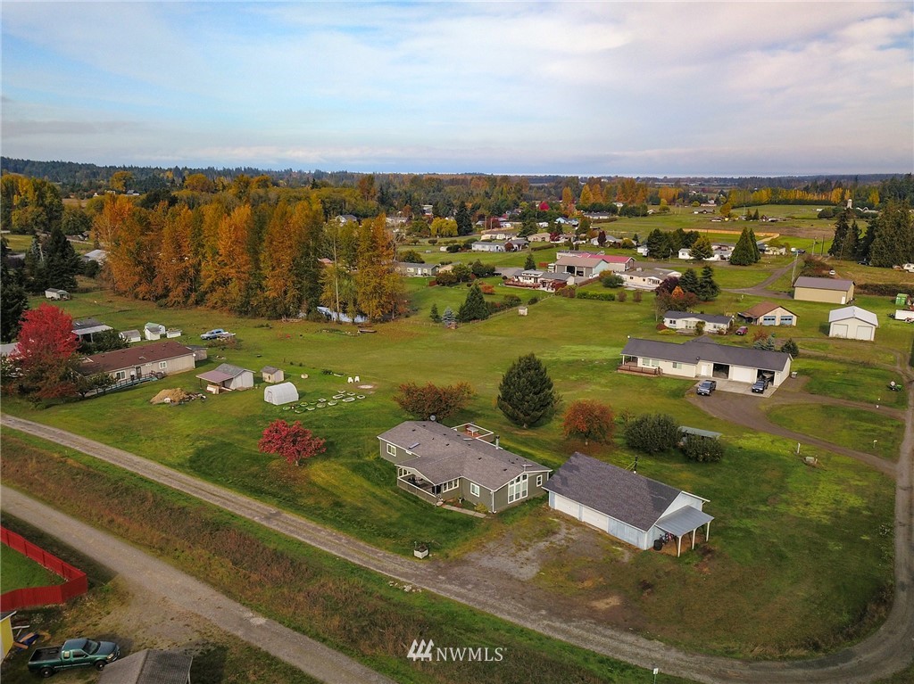 411 Spencer Road Sequim, WA 98382 - Photo 6 of 40 an aerial view of residential houses with outdoor space