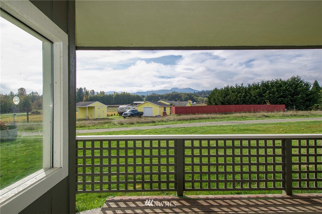 411 Spencer Road Sequim, WA 98382 - Photo 9 of 40 a view of a balcony with an outdoor space