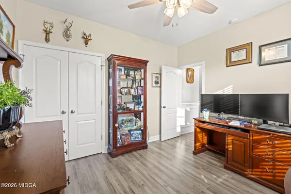 a room with furniture and wooden floor