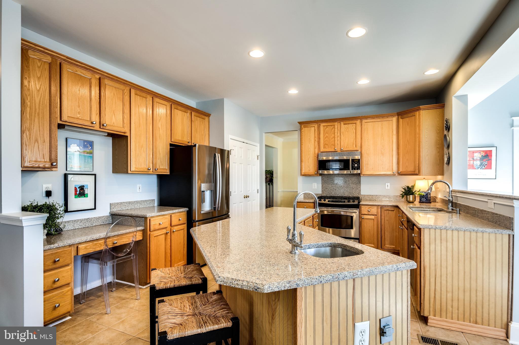 5928 Sandy Ridge Elkridge, MD 21075 - Photo 11 of 47 Center island with vegetable sink