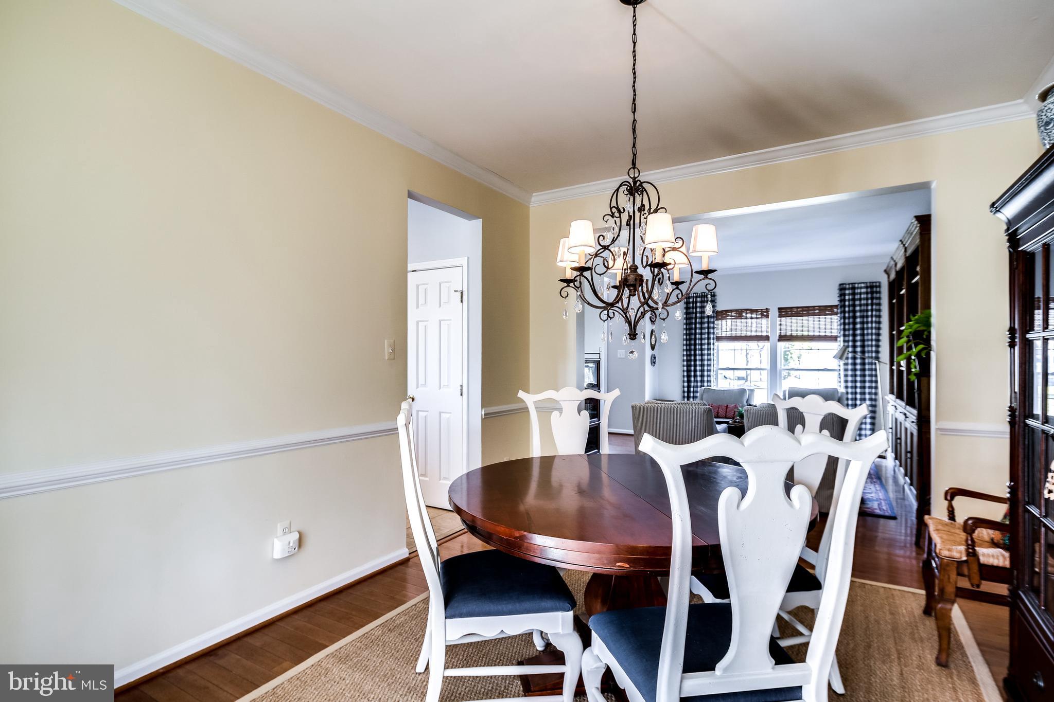 5928 Sandy Ridge Elkridge, MD 21075 - Photo 10 of 47 Chair rail and crown moldings