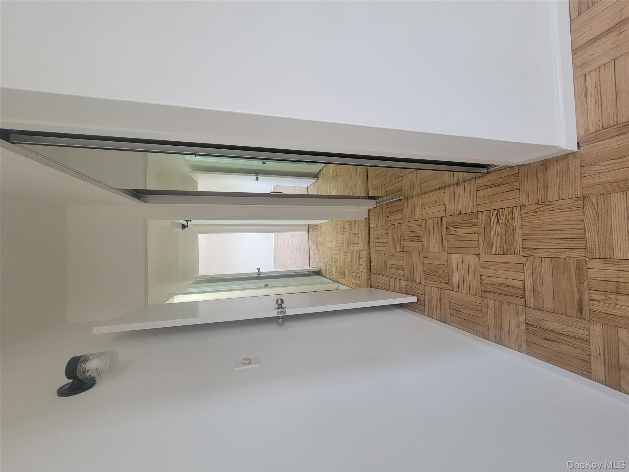 7 Fordham Hill Ovl, Unit 16C Bronx, NY 10468 - Photo 16 of 17 a view of a hallway from a hallway