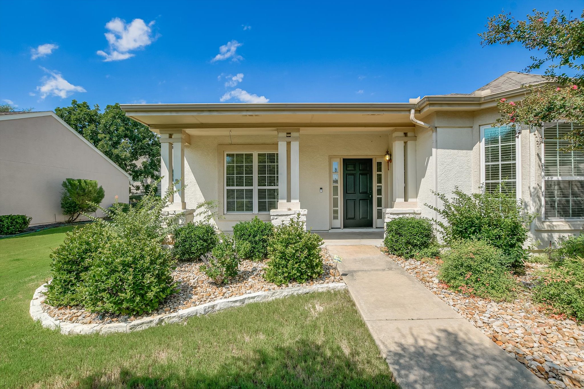 603 Rio Grande Loop Georgetown, TX 78633 - Photo 3 of 27 Doorway to property featuring stucco siding and a porch