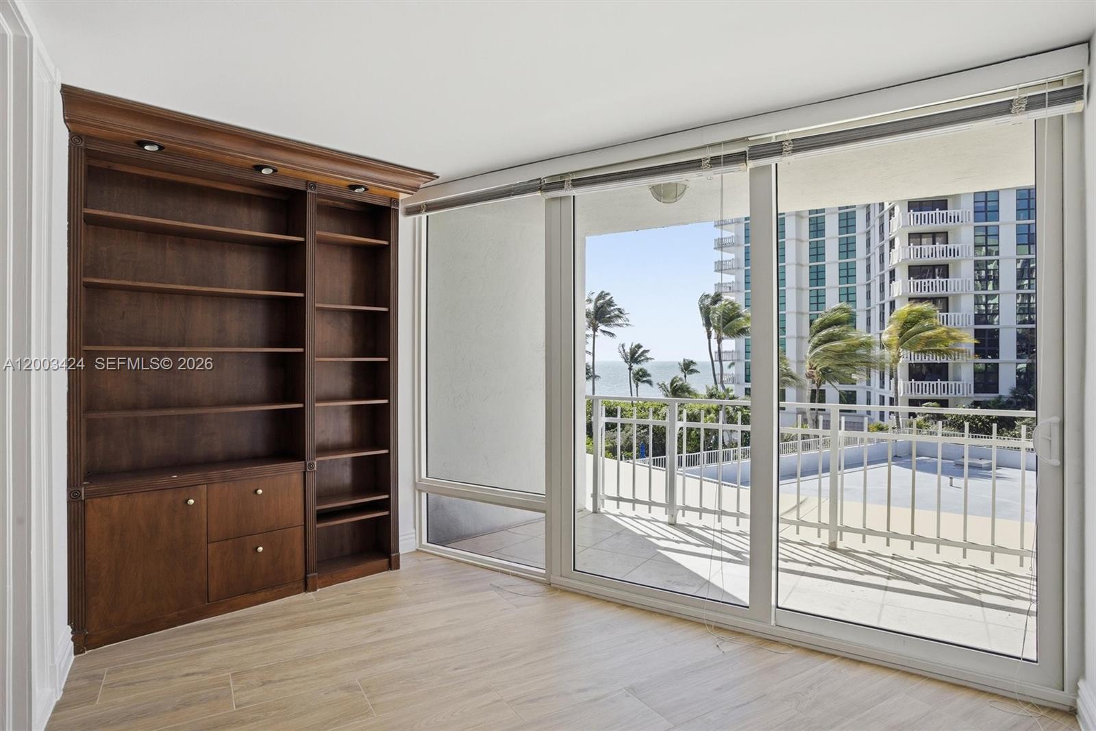 600 Grapetree Drive, Unit 4BS Key Biscayne, FL 33149 - Photo 39 of 75 a view of walk in closet with empty racks