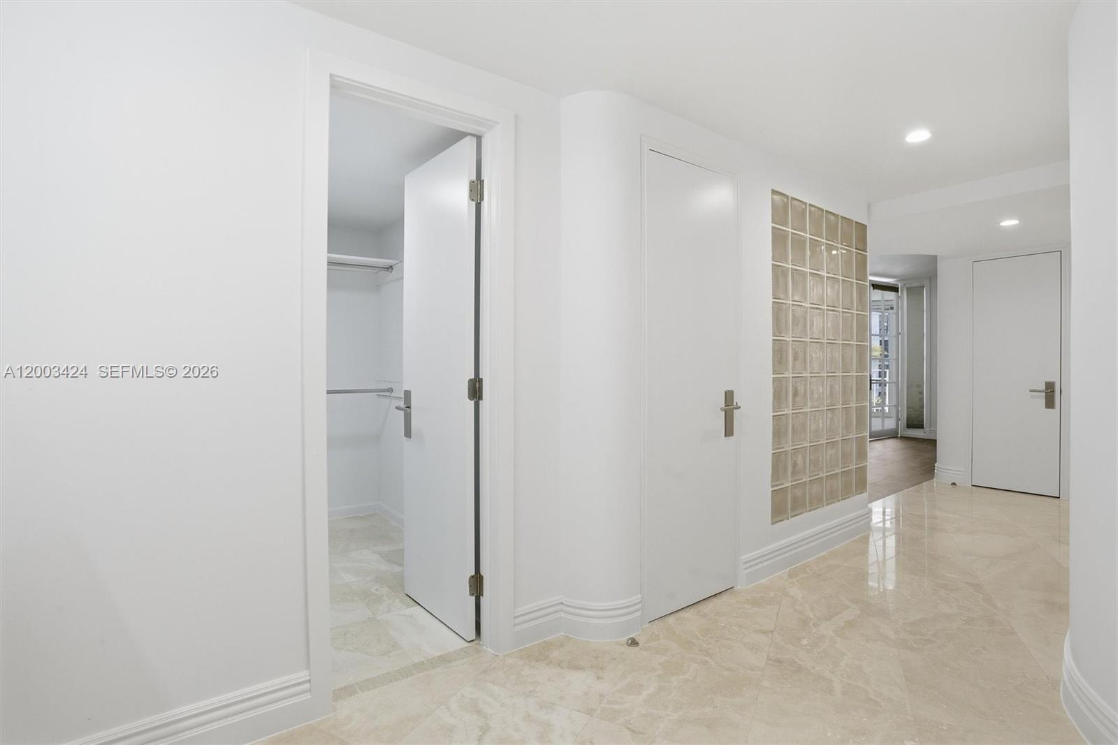 600 Grapetree Drive, Unit 4BS Key Biscayne, FL 33149 - Photo 41 of 75 a bathroom with a shower and a glass door