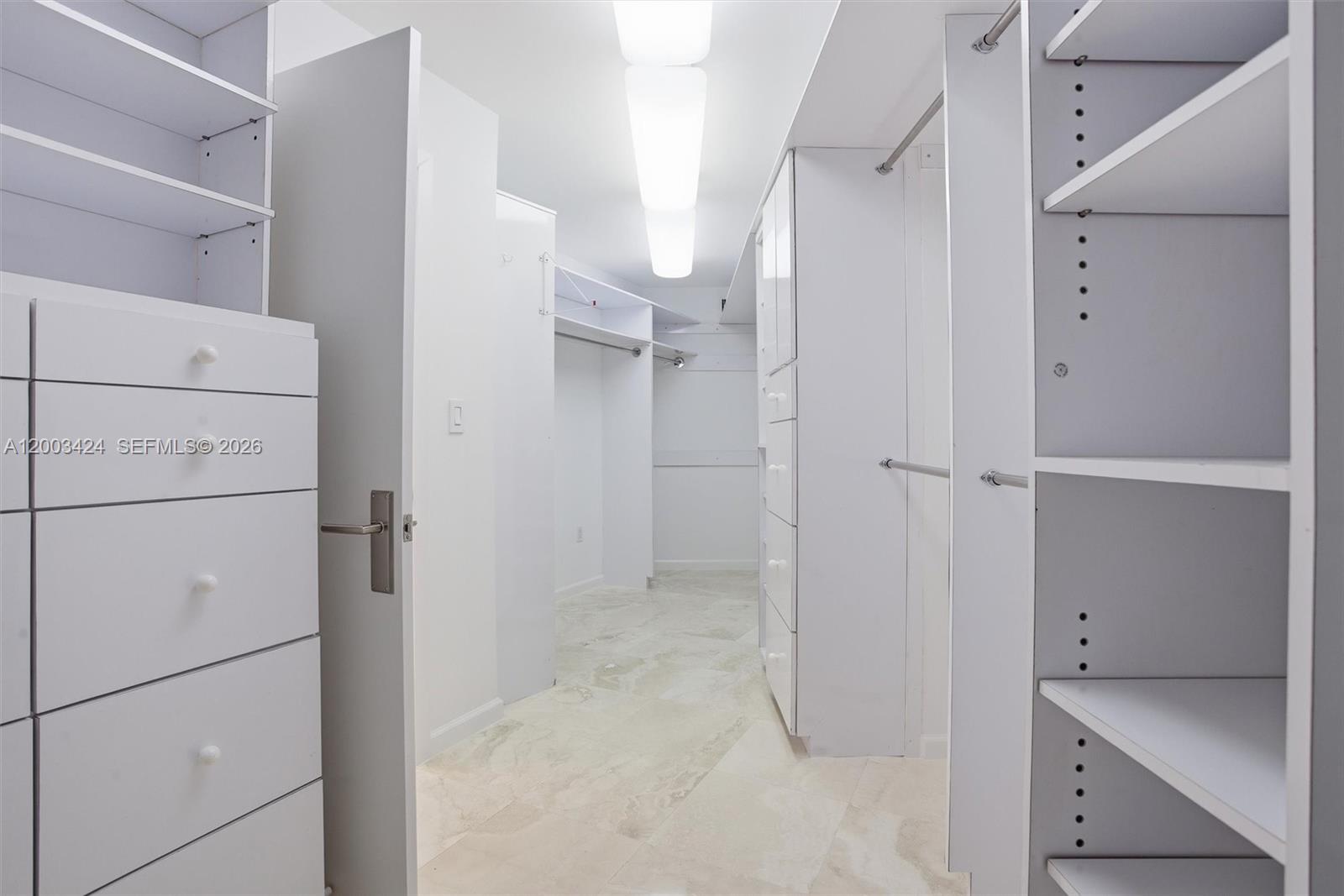 600 Grapetree Drive, Unit 4BS Key Biscayne, FL 33149 - Photo 42 of 75 a view of walk in closet