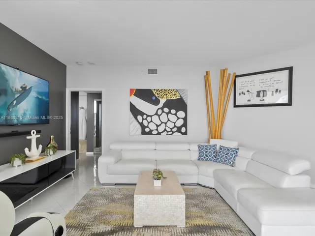 a living room with furniture and a couch